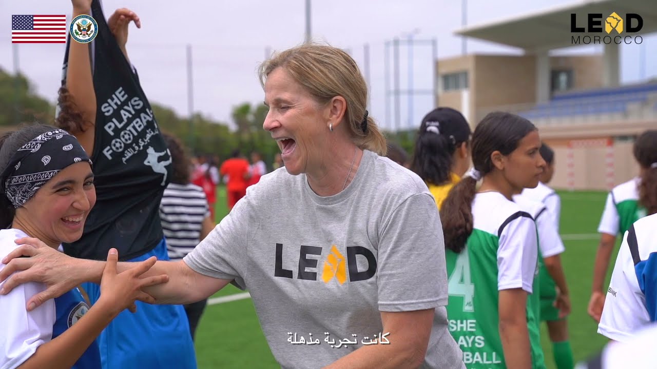 She Plays Football: She plays football.